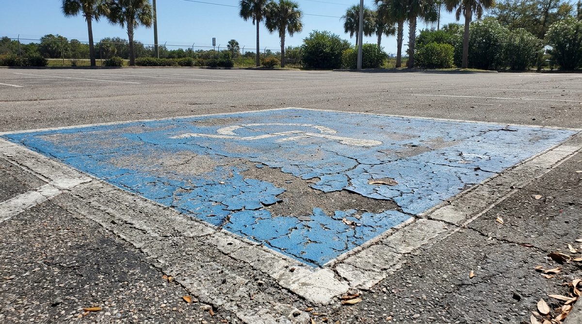 Faded accessible parking space